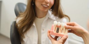 dental implants being shown to a patient