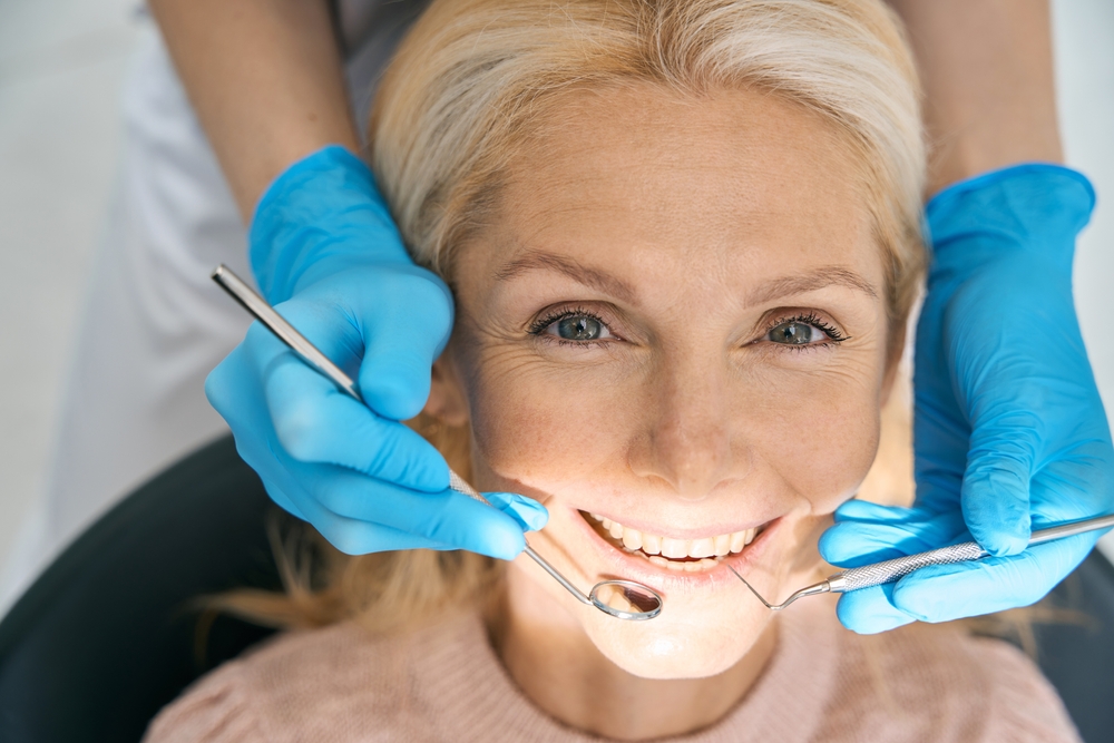 woman receiving a dental cleaning