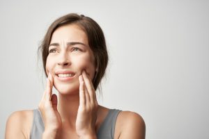 woman dealing with toothaches