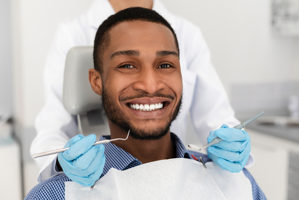 young man visiting the dentist