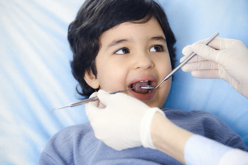 young kid at the dentist